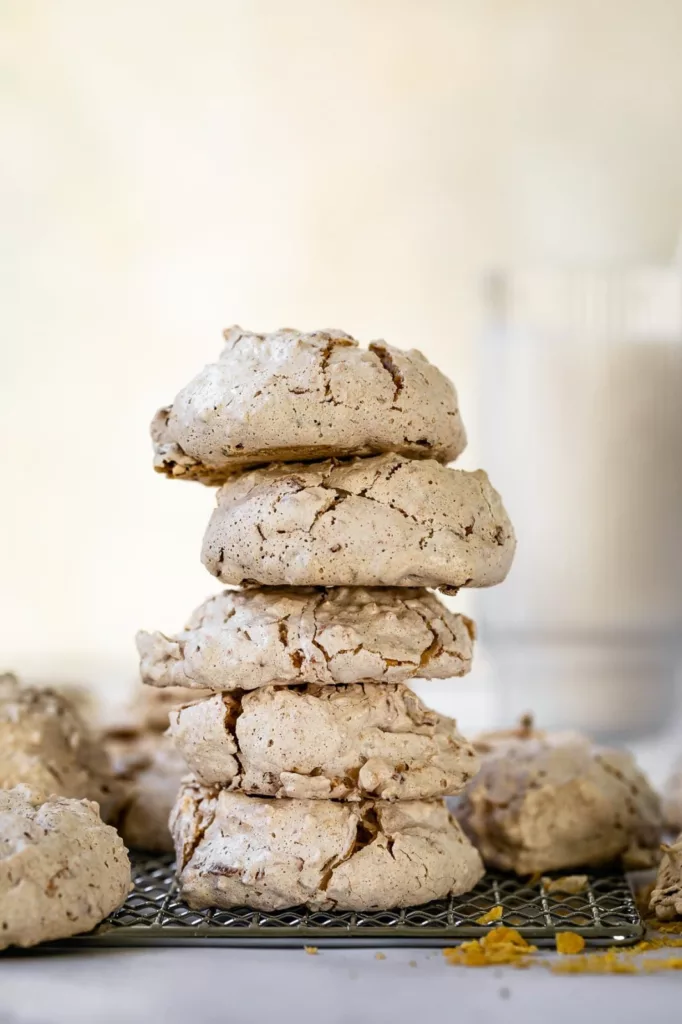 With the addition of corn flake crumbs, these coconut cookies are a cross between meringue cookies and coconut macaroons.