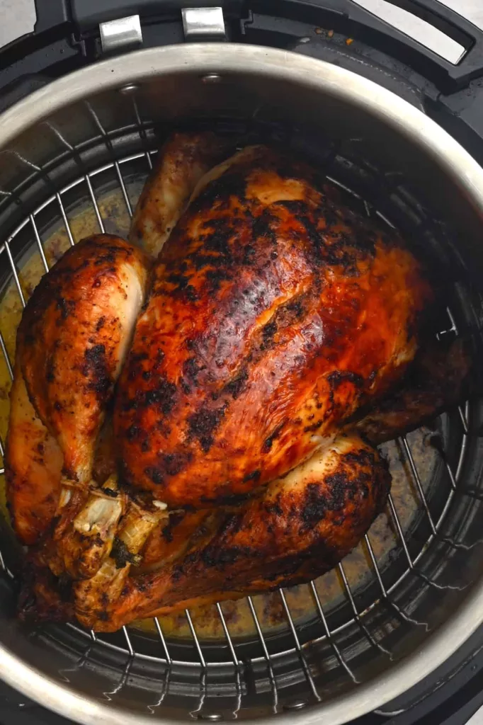 This air fryer whole chicken is juicy, soft, and flavorful. It cooks in approximately an hour and is really easy to create, guaranteeing flawless results every time!