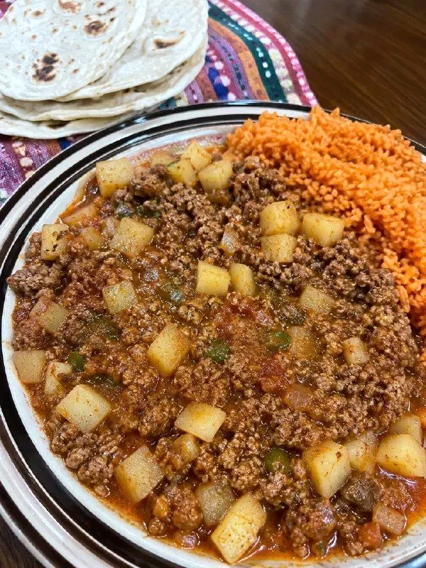 Mexican Picadillo con Papas with Arroz Rojo
